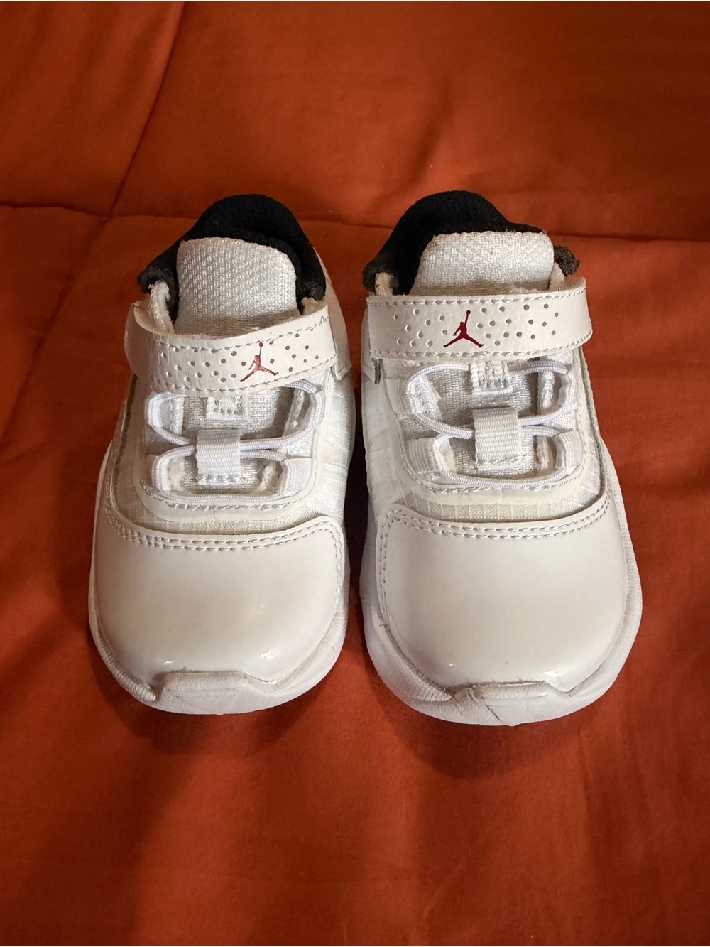 Jordan Kids White Slip-On Sneakers with Red Jumpman Accent